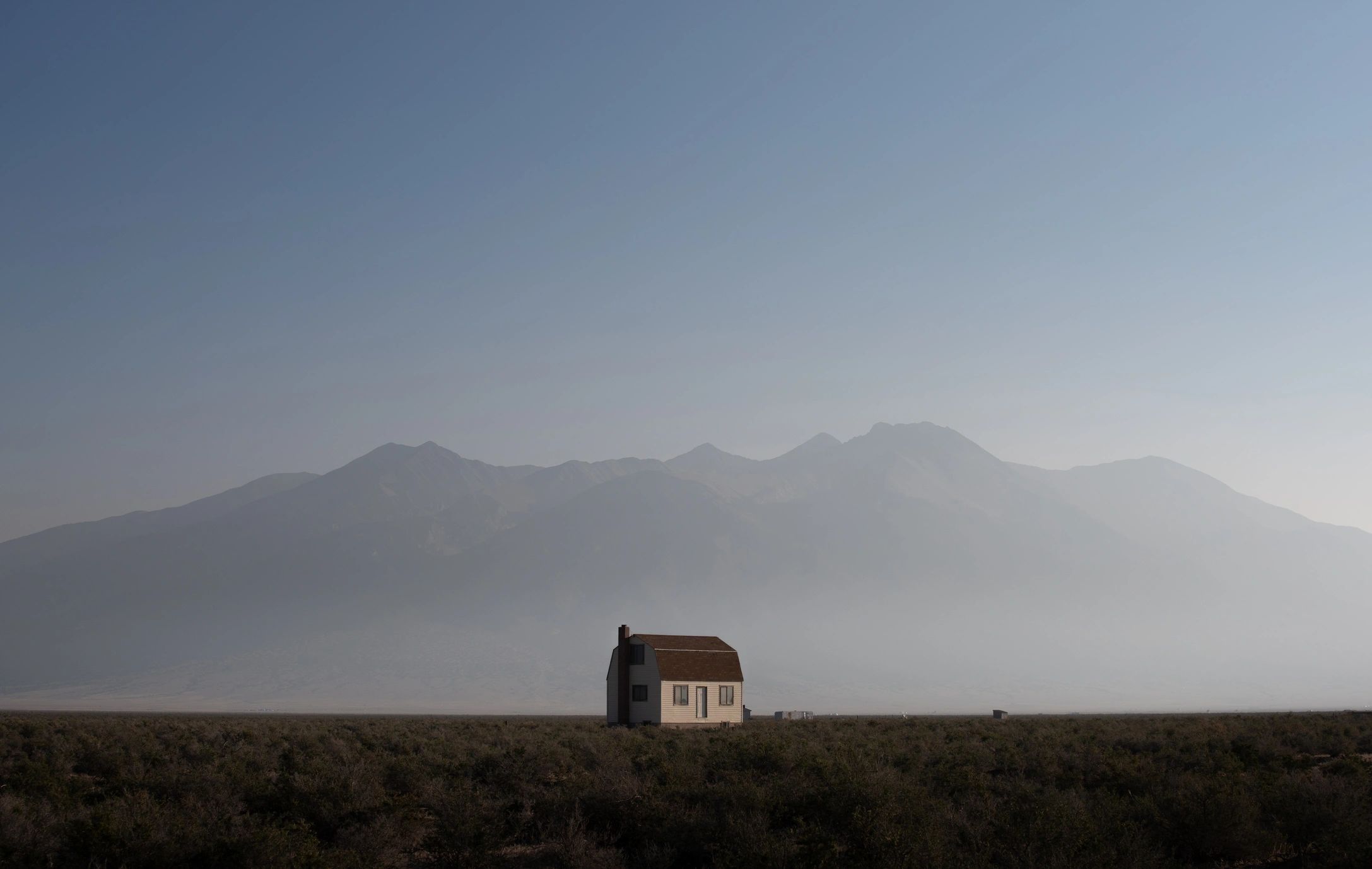 Rural building with metal roof in open countryside